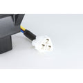 White three-pin electrical connector attached to black and yellow wires with a black plastic component nearby.