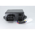 Compact black plastic DRL controller with dual connector ports and multicolored wiring harness.