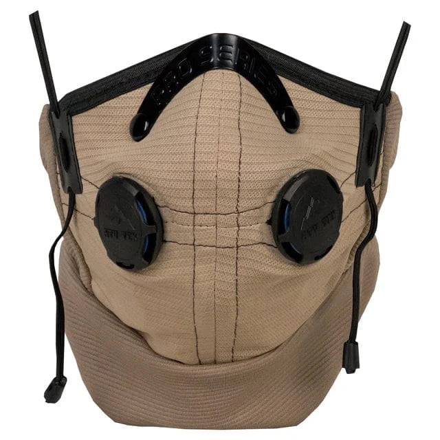 The Pro Series Rider Dust Mask (Tan-XL) by ATV-TEK features two black exhaust valves, adjustable ear straps, and efficient filtration for a secure fit and optimal breathability.