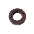 Brown rubber oil seal with inner metal spring ring, circular with a hollow center, size 15x26x6mm.