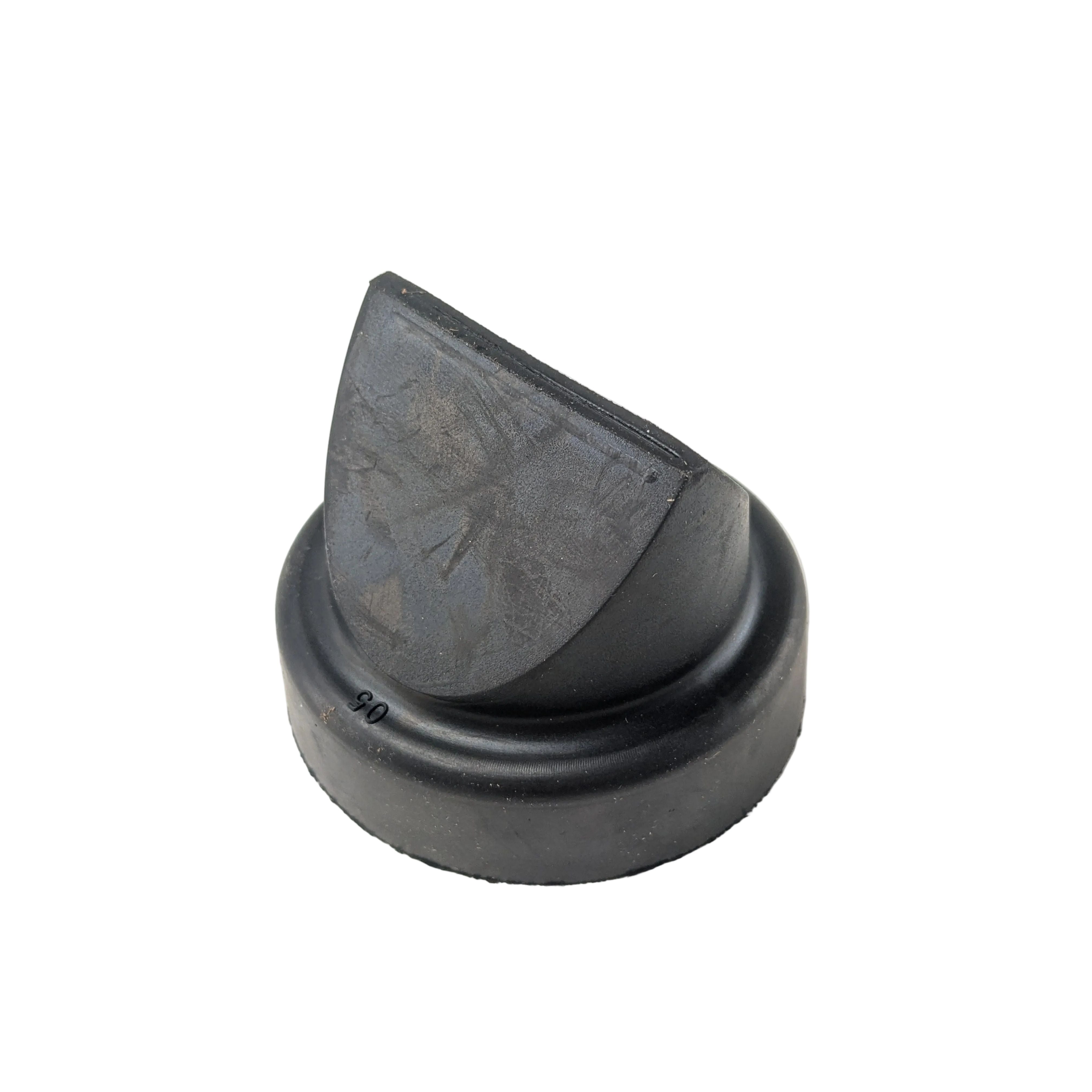 Black rubber duck bill valve with angled slit opening and circular base.