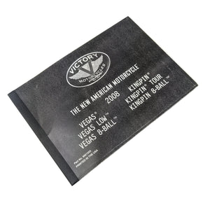 Black softcover service manual with white Victory Motorcycles logo and text listing 2008 Kingpin, Vegas, and 8 Ball models.