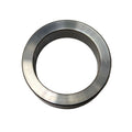 Metal front drive pulley spacer with smooth, polished surface and circular shape.