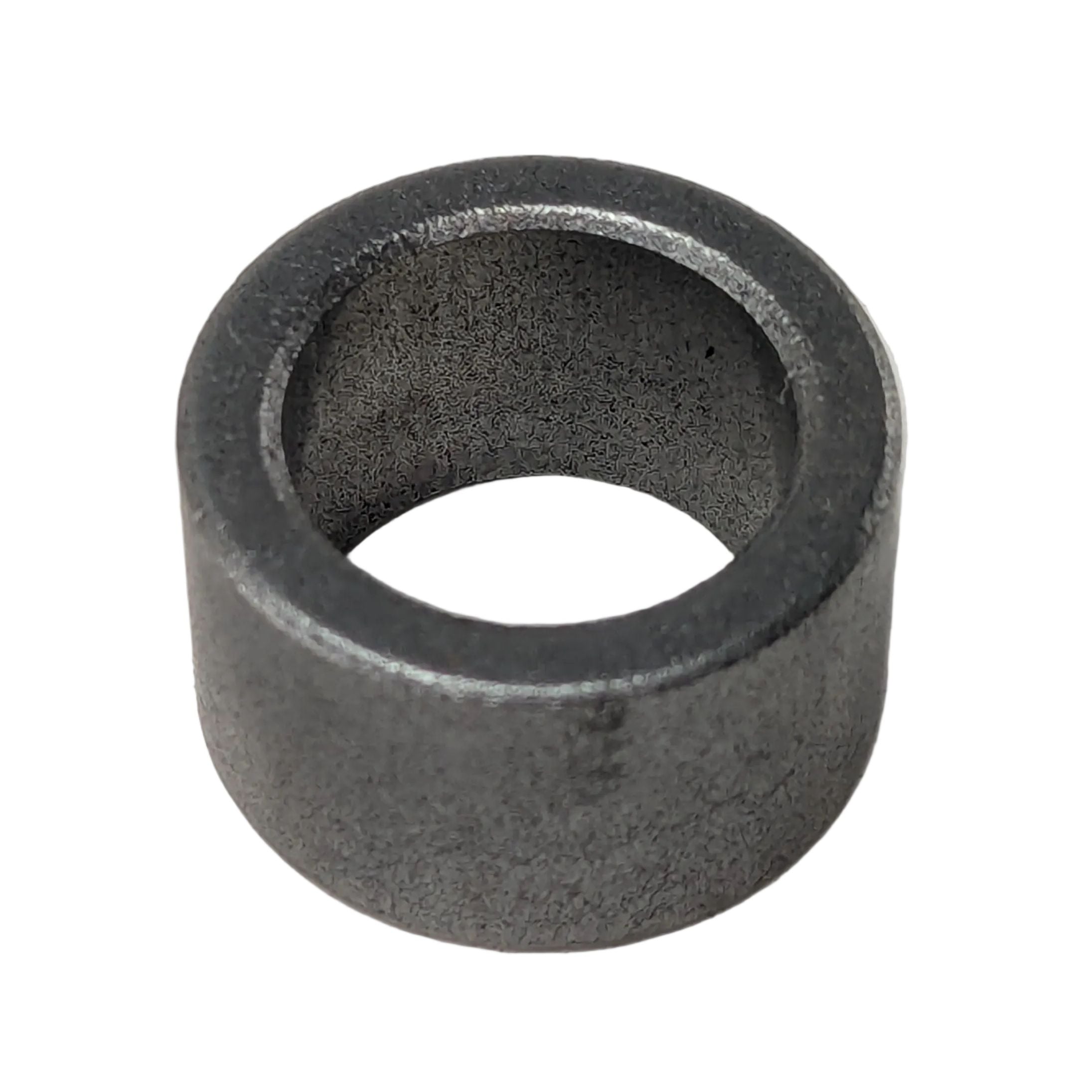 Dark gray cylindrical metal bushing with hollow center and smooth outer surface.