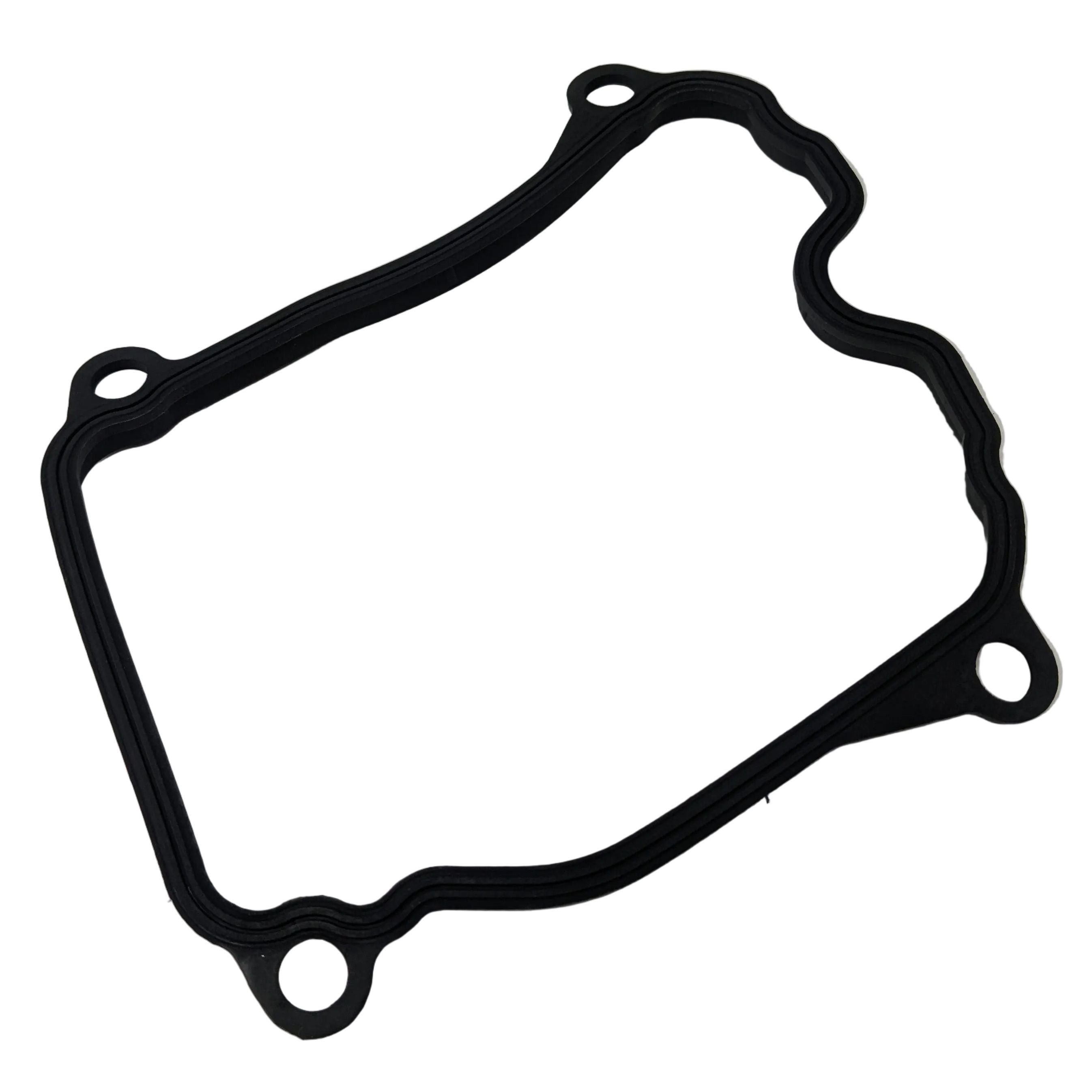 Black rubber engine cylinder gasket with irregular rounded shape and four mounting holes.