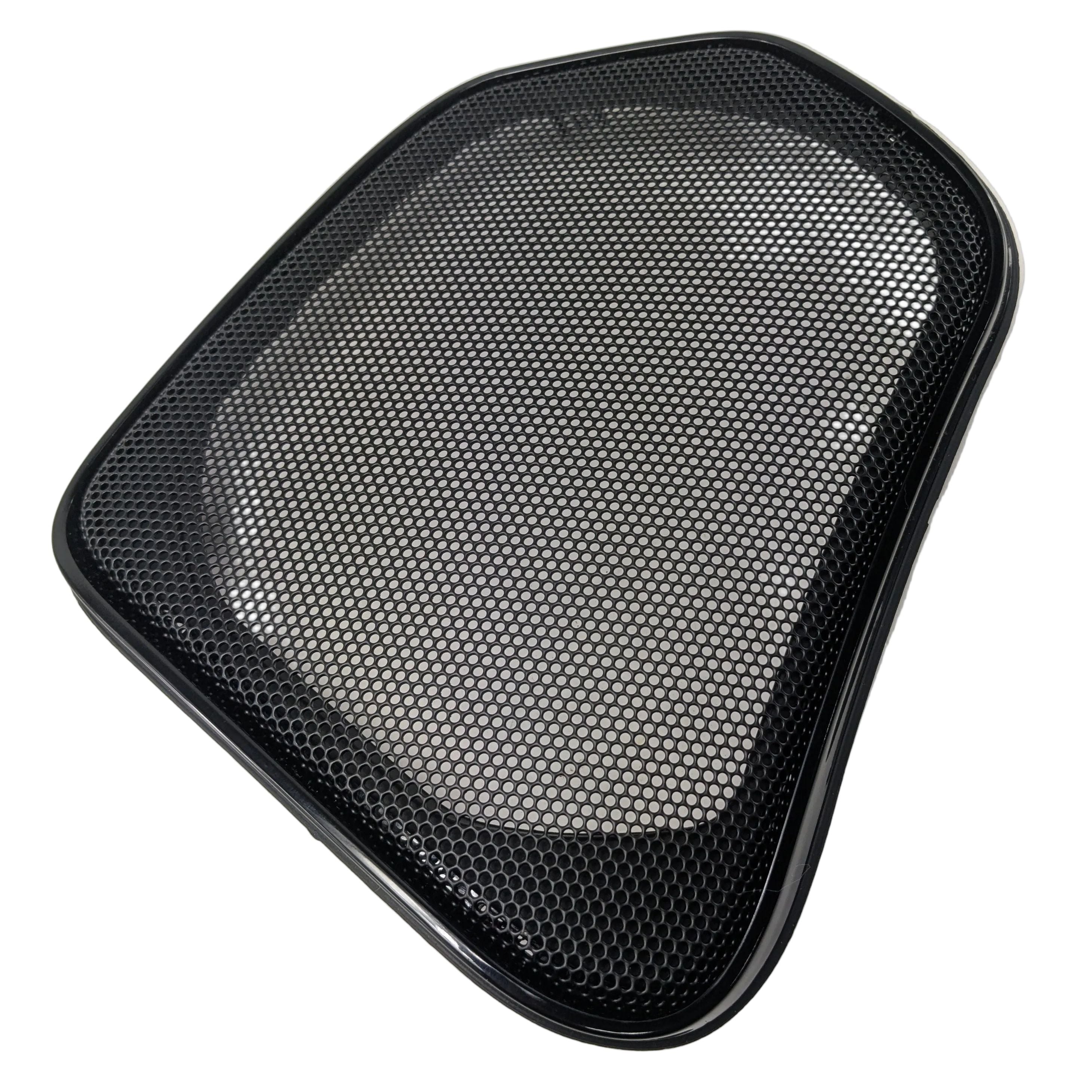 Black mesh speaker grill with rounded triangular shape and smooth frame.