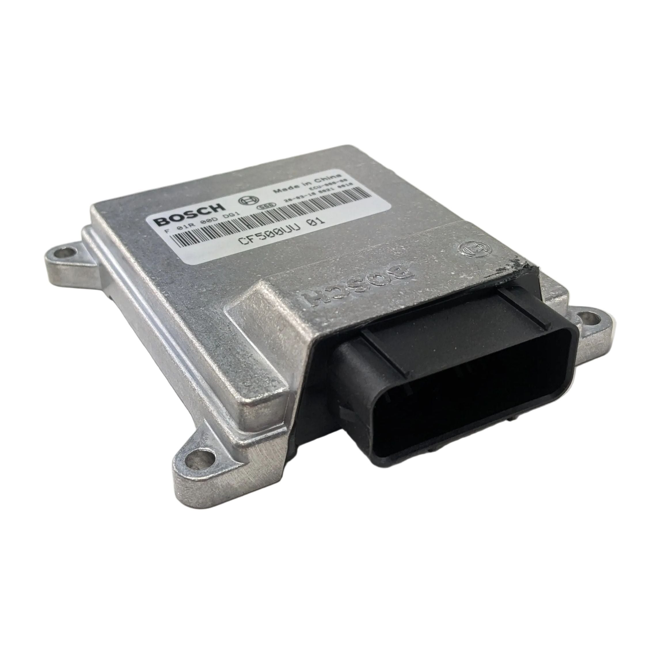 Rectangular silver metal ECU with black plastic connector and mounting holes on each corner.