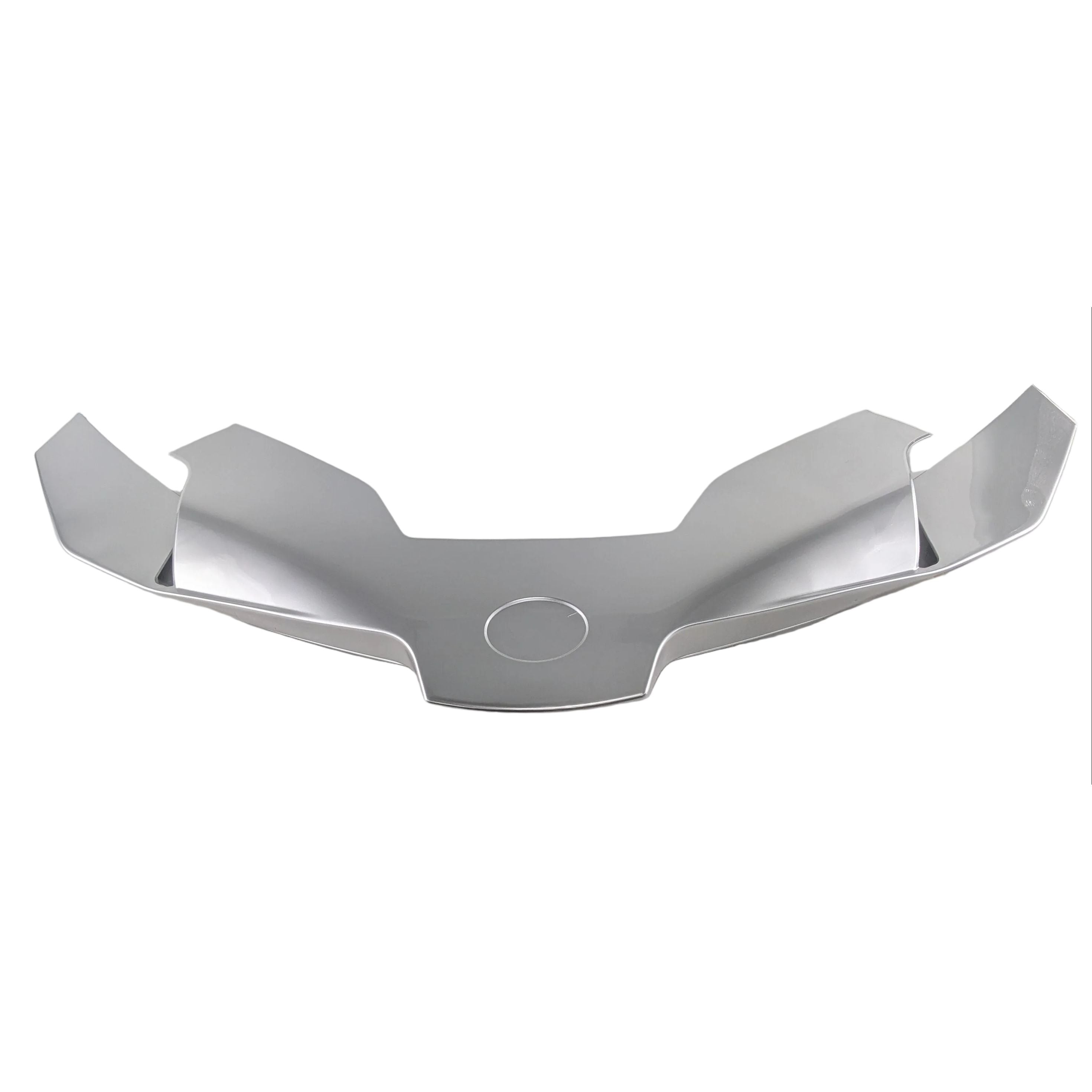 Silver metallic headlight panel with angular contours and central circular indent, designed for offroad vehicle front.