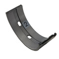 Curved metallic gray bearing-main upper with two mounting holes and "2" marking.