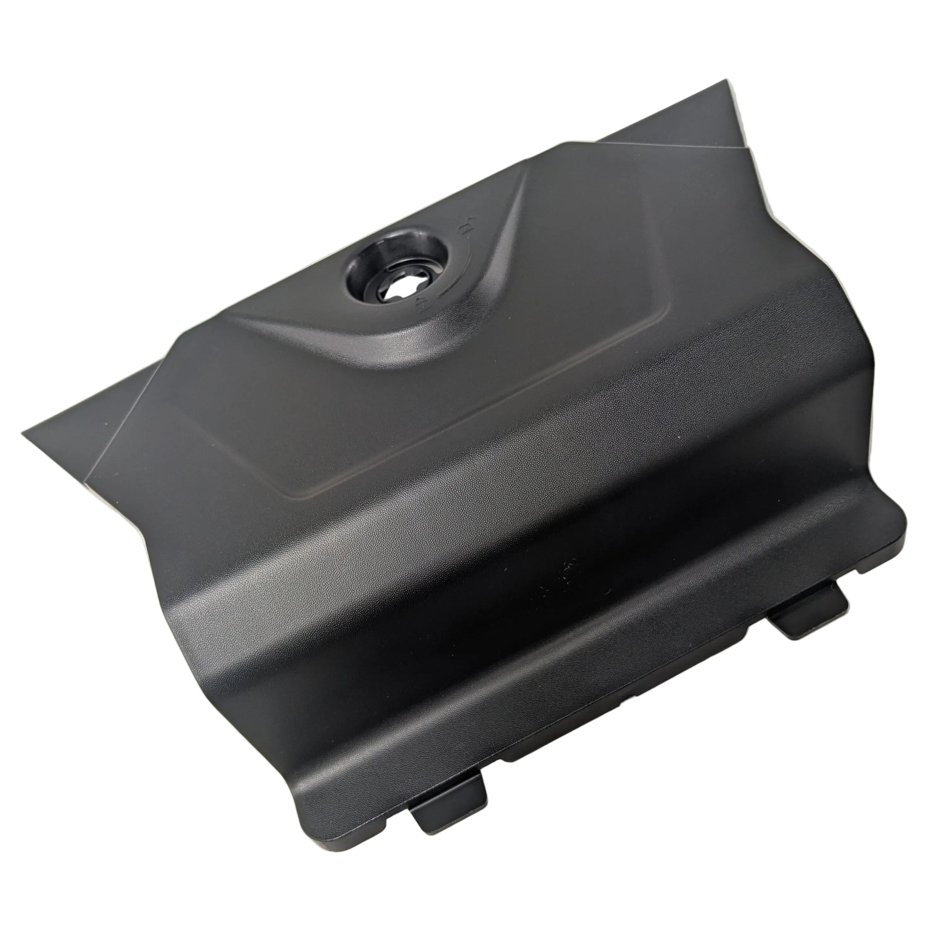 Matte black molded plastic cover with angular design and central circular opening.