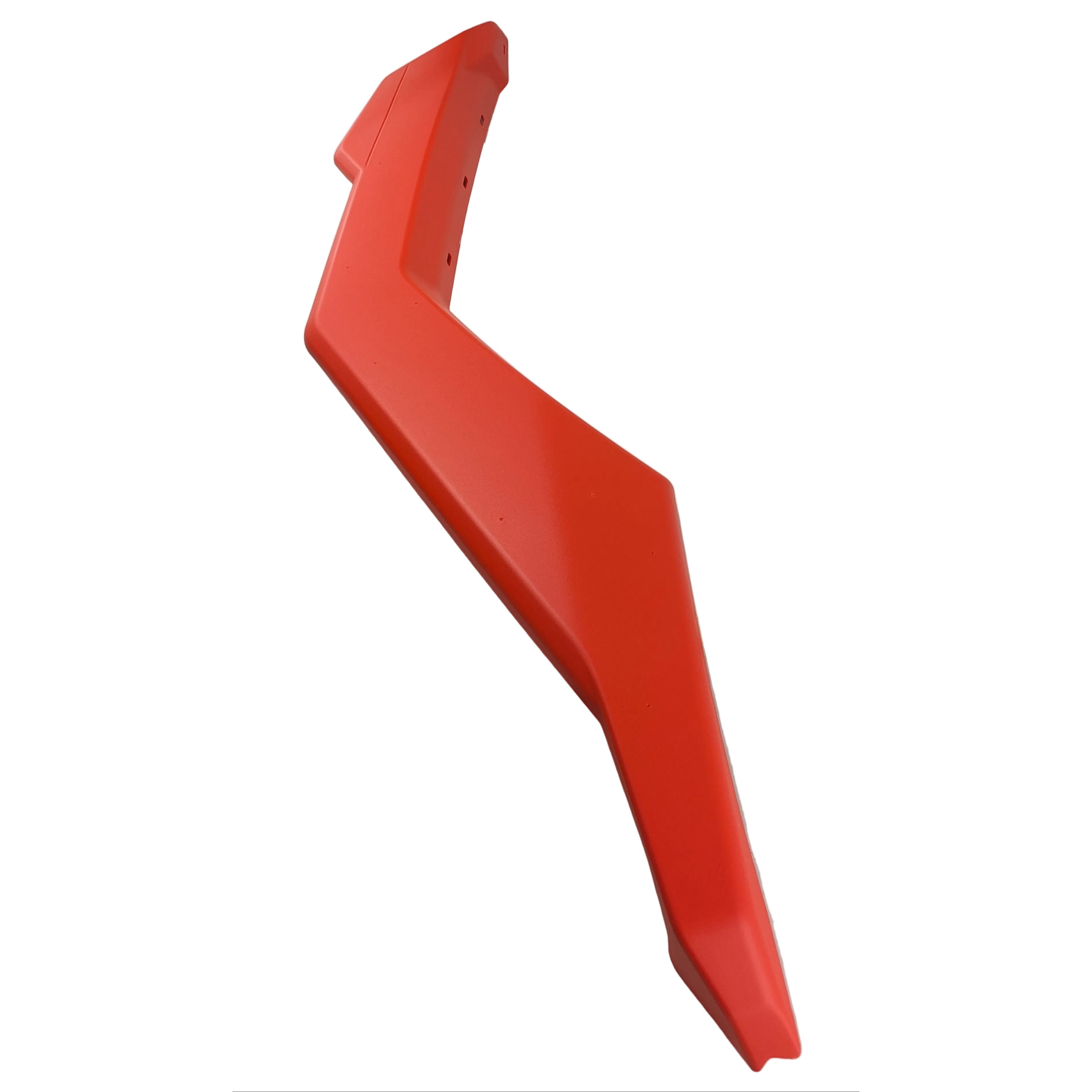 Bright red angular plastic mud guard with smooth surface and sharp edges designed for left rear side of off-road vehicle.