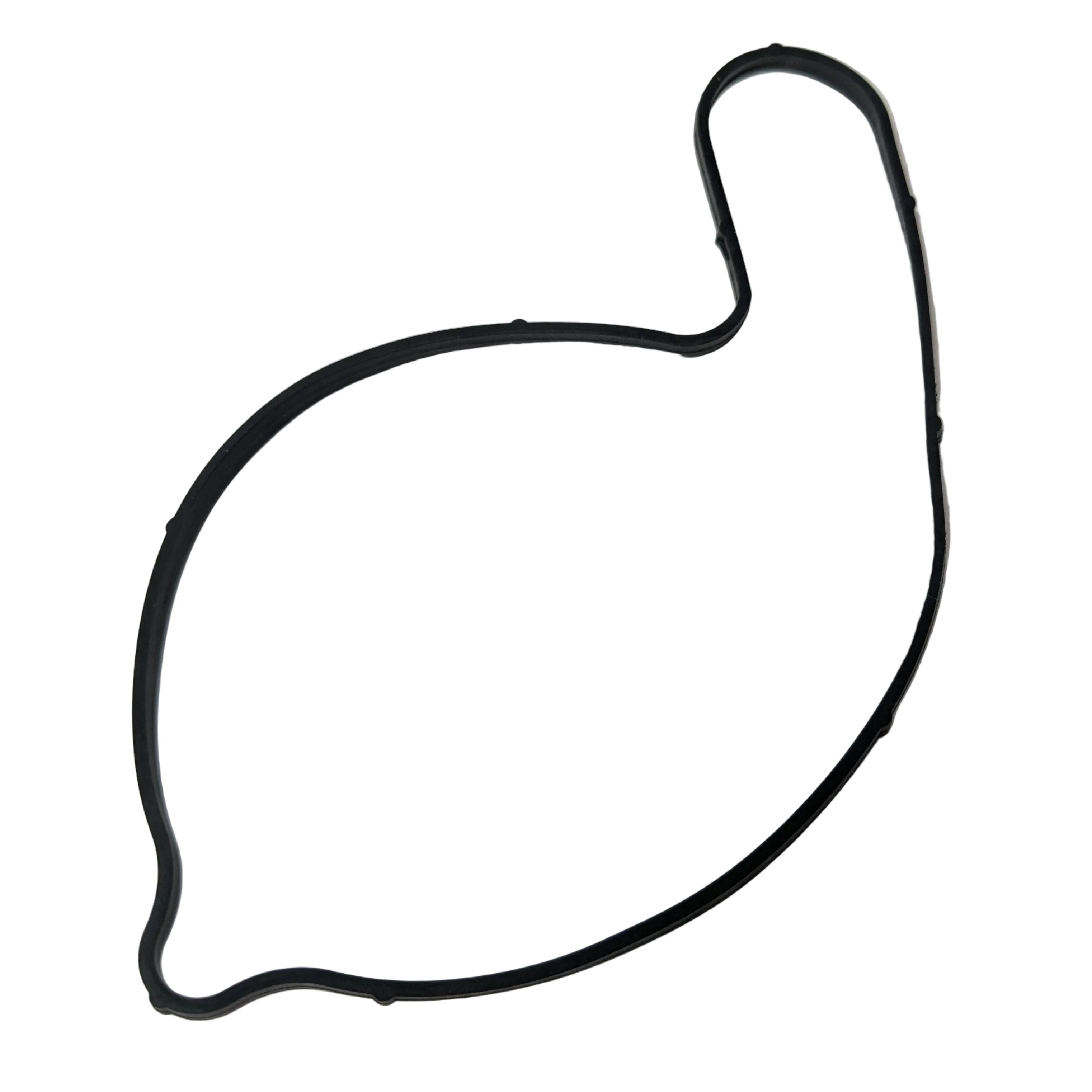 Black rubber water pump seal gasket with irregular rounded shape and one curved extension.