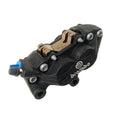 Black metal front brake caliper with Brembo logo, silver bolts, and blue bleed valve.