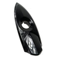 Glossy black plastic saddlebag lock bezel with a teardrop shape and central circular opening.