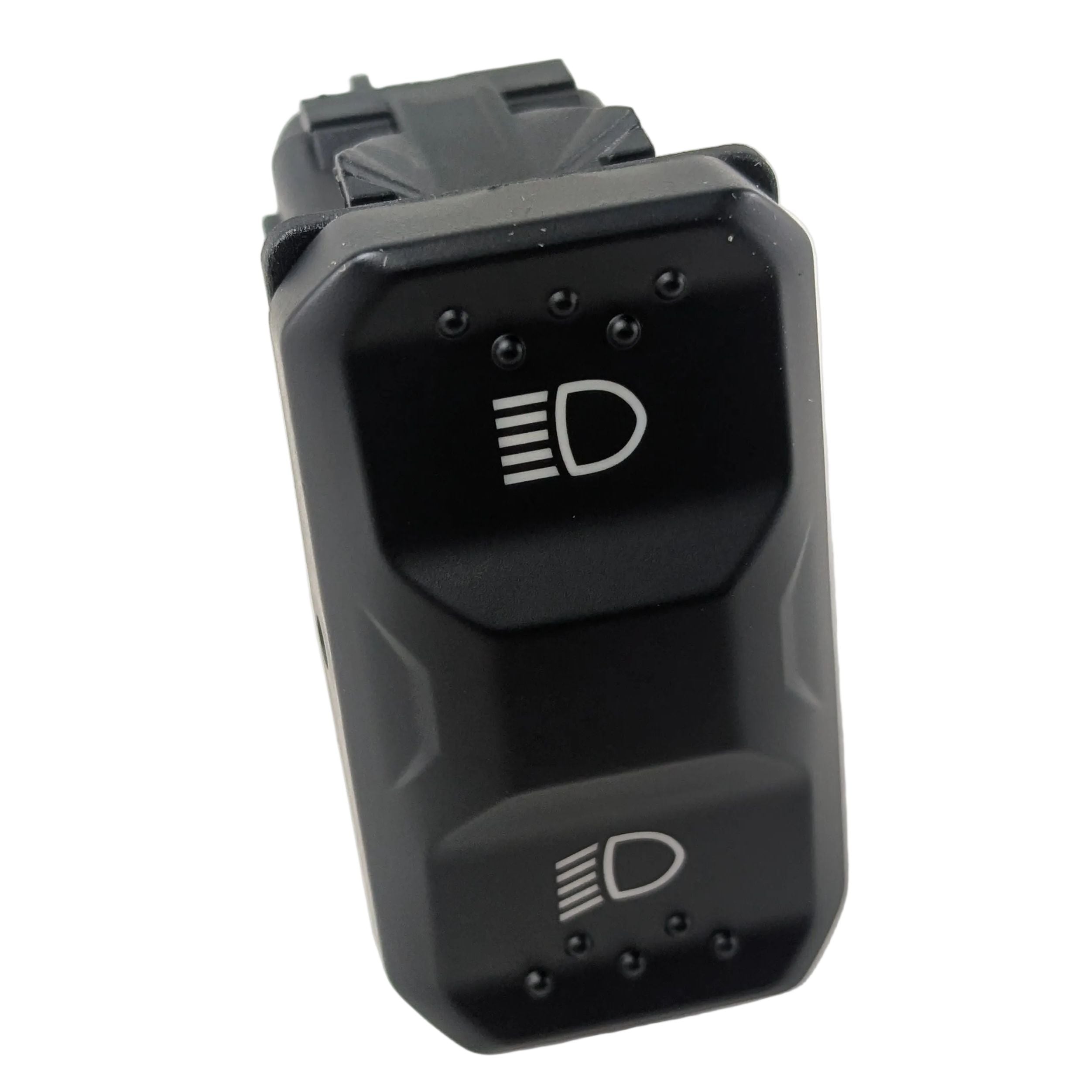 Black plastic rectangular dimmer switch with headlight icons and textured grip sides.