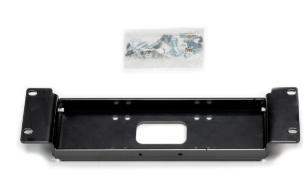 The Polaris Ranger 570 SP Winch Mounting Kit by Warn, featuring a black metal bracket with a rectangular cutout for ATV winch installation, is shown on a white surface alongside corrosion-resistant hardware in a plastic bag.