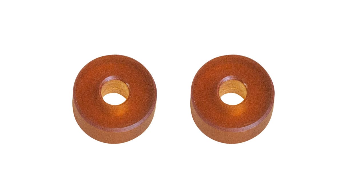 Two upgraded secondary rollers for 2016+ RZR XP 1000 by Trinity Racing, brown and cylindrical with center holes, made from heat-resistant compounds, shown side by side on a white background.