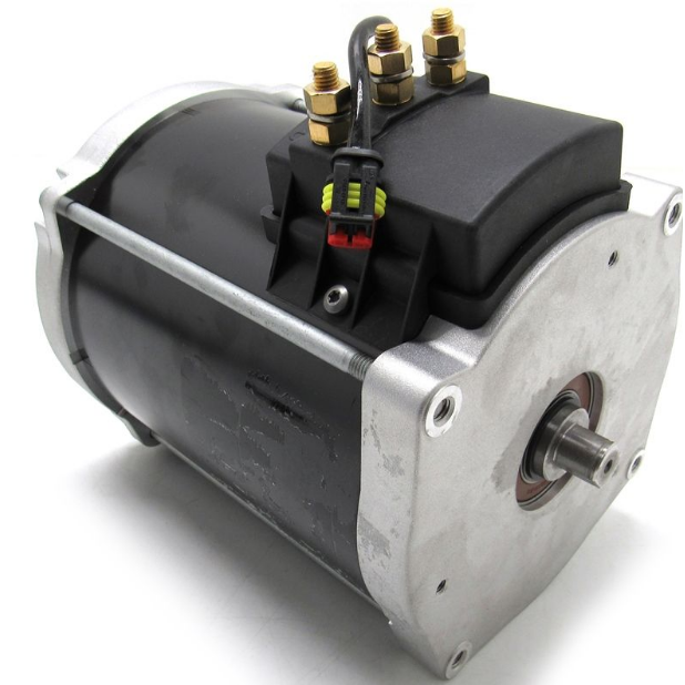 Black cylindrical motor clocked 72V AC kit with silver metal mounting plate and three brass electrical terminals.