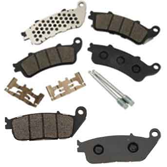 The Victory Vision Brake Pad Kit (Front and Rear) by Witchdoctors includes motorcycle brake pads, hardware clips, a perforated metal plate, and two metal pins displayed on a white background.