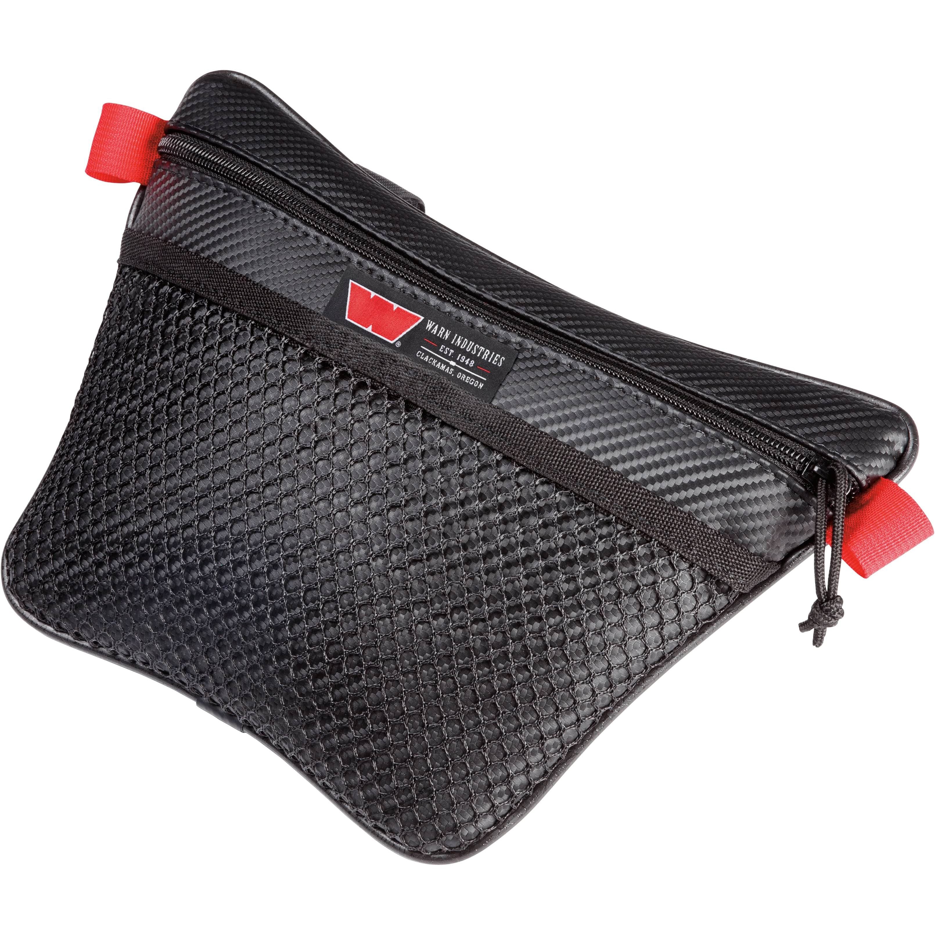 A black Slim Size Passenger Grab Handle Bag by Warn with a textured honeycomb front, red heavy-duty zipper pulls, and water-resistant carbon fiber-like material.