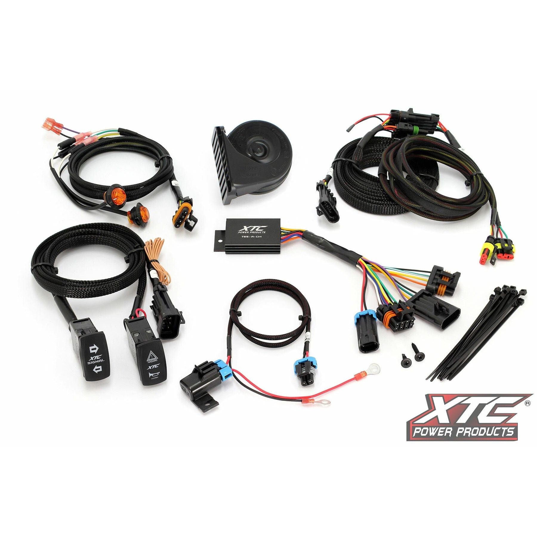 The Self Canceling Turn Signal Kit Can by XTC Power includes cables, connectors, switches, zip ties, and a horn—arranged neatly with an easy-to-install design. The XTC Power Products logo is shown in the lower right corner.