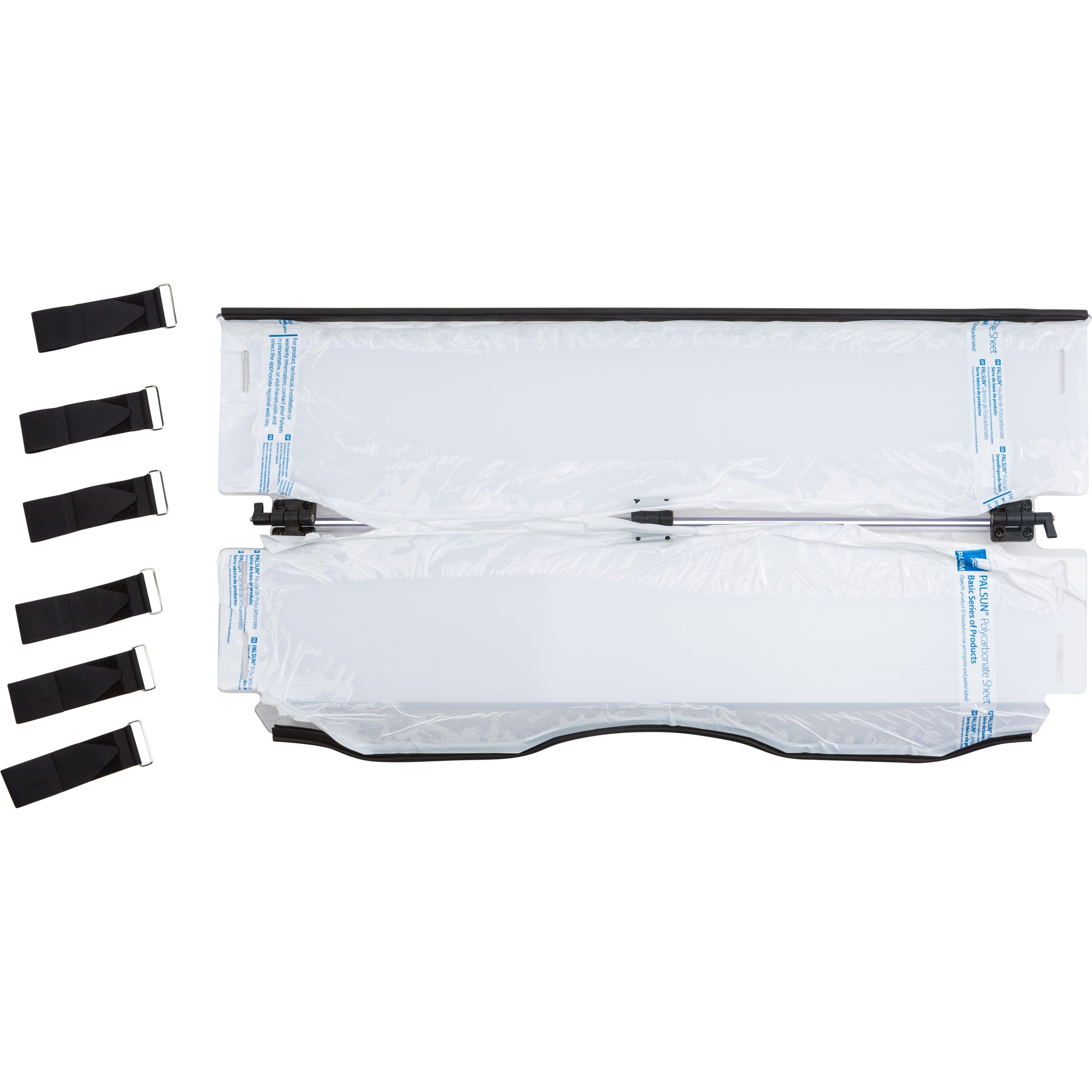 The Folding Windshield by Open Trail is shown open, featuring a transparent polycarbonate cover. Five black securing straps with metal buckles are displayed to the left of the windshield.