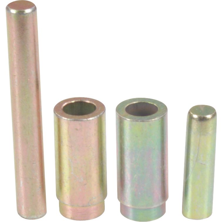 Four metallic cylindrical spacers of different sizes stand upright in a row against a white background. They are parts from the Spider Tool Polaris by SLP pin and roller remover set, with the rightmost spacer appearing solid.
