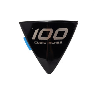 The Cheese Wedge Badge [Hammer S] by Polaris is a black triangular emblem for Victory motorcycles, featuring "100 CUBIC INCHES" in silver, a blue tab on the left, and a white background—perfect for OEM Victory Polaris parts.