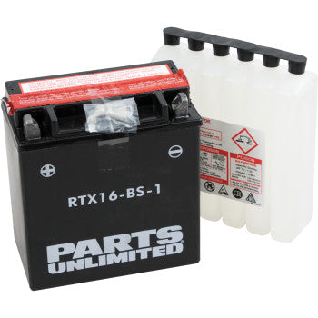 A black AGM Battery YTX16 BS 1.8 L by Parts Unlimited sits in front of a clear plastic acid pack with warning labels and black caps.