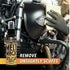 A gloved hand uses a cloth to clean a black motorcycle gas tank. In the foreground is Melt Magic Exhaust Pipe Burn And Boot Mark Remover 4Oz by Hog Wash. “REMOVE UNSIGHTLY SCUFFS” is overlaid at the bottom of the image.