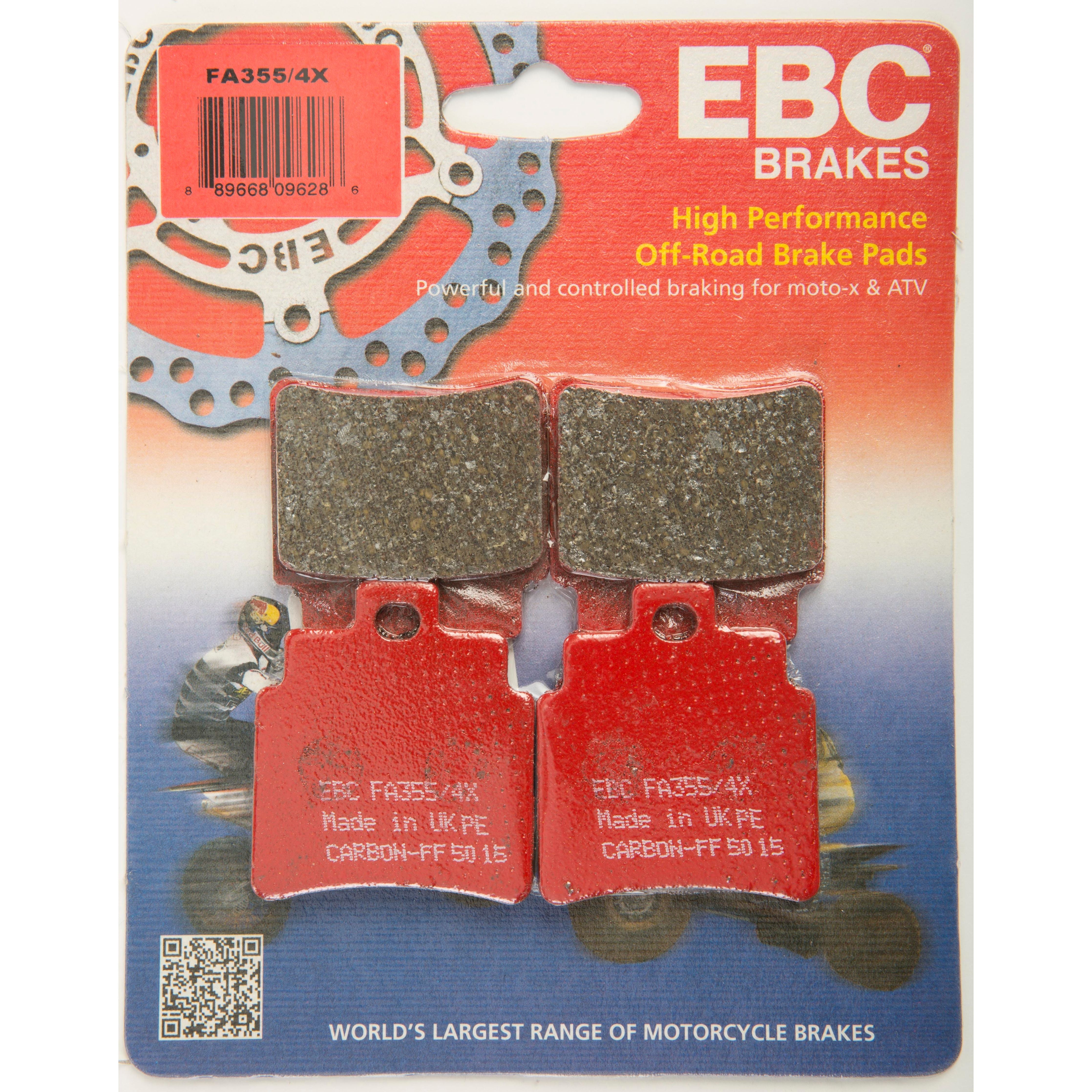 Set of two rectangular red brake pads with textured friction surfaces, branded EBC Brakes packaging with orange and blue.