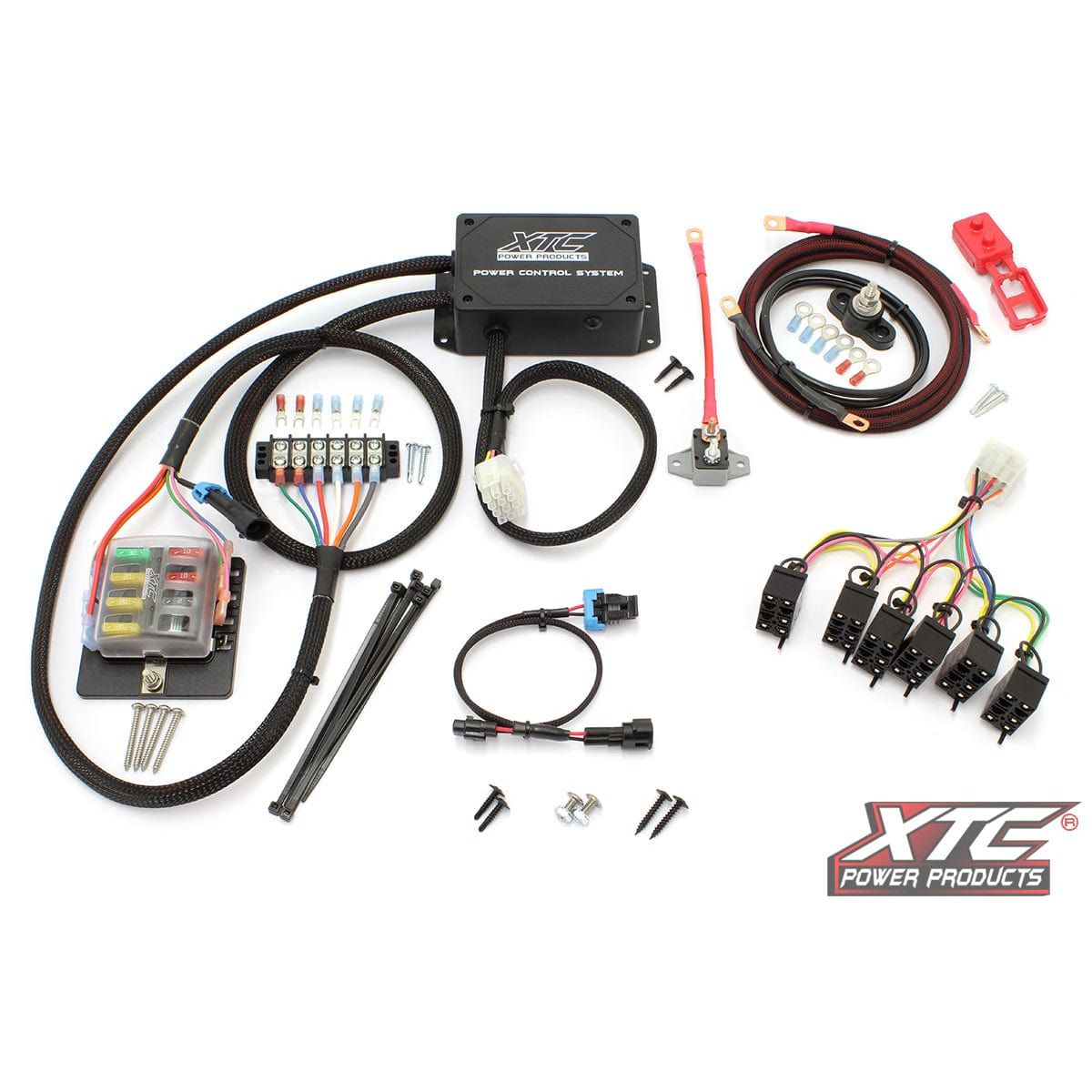 A Plug N Play Power Control 6 Switch Not Included Yam by XTC Power kit with fuse block, wiring harnesses, connectors, mounting hardware, cable ties, and electrical components is displayed on a white background.