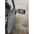 Close-up of the Adjustable Foot Rest Kit Contrast Cut Style by Witchdoctors on concrete, featuring textured adjustable pegs and sturdy metal parts—ideal comfort accessories to upgrade your Victory Cross Country motorcycle.