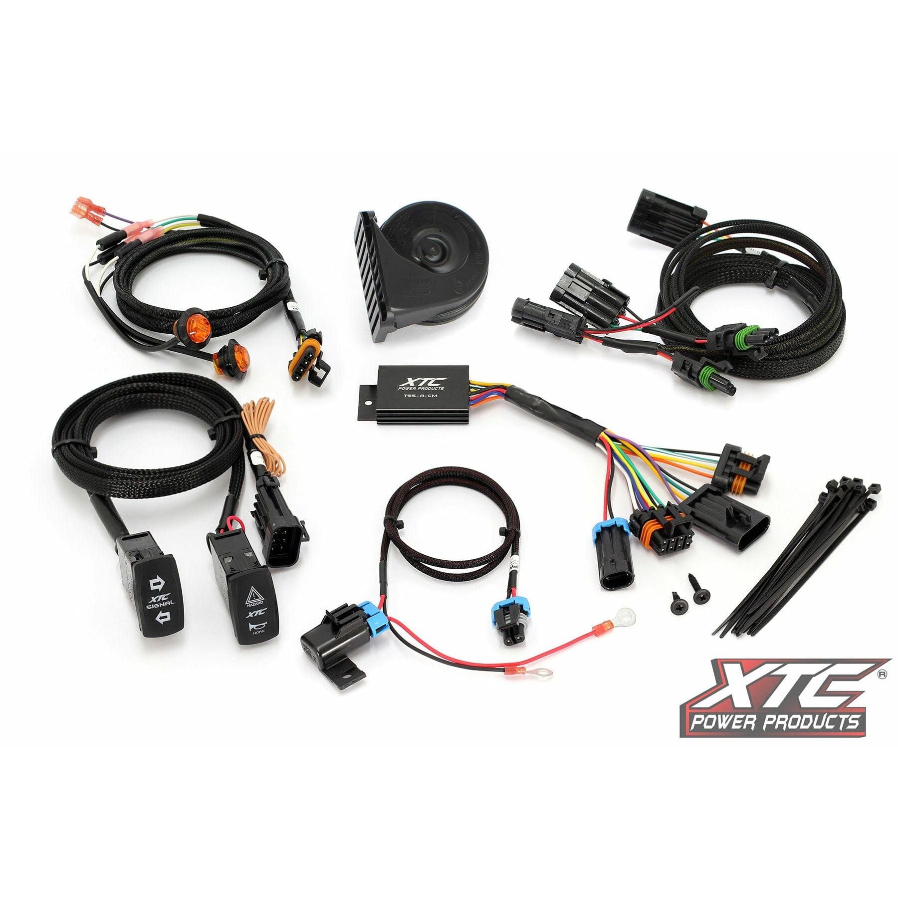 The Self Canceling Turn Signal Kit Can by XTC Power and its components, including wiring harnesses, connectors, horn, and installation hardware, are arranged on a white background with the XTC Power Products logo in the bottom right corner.