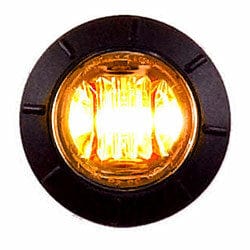 A close-up of the Univ 3/4 Round Turn Signal Light by XTC Power, featuring a round yellow-orange LED glowing brightly within a black circular frame.