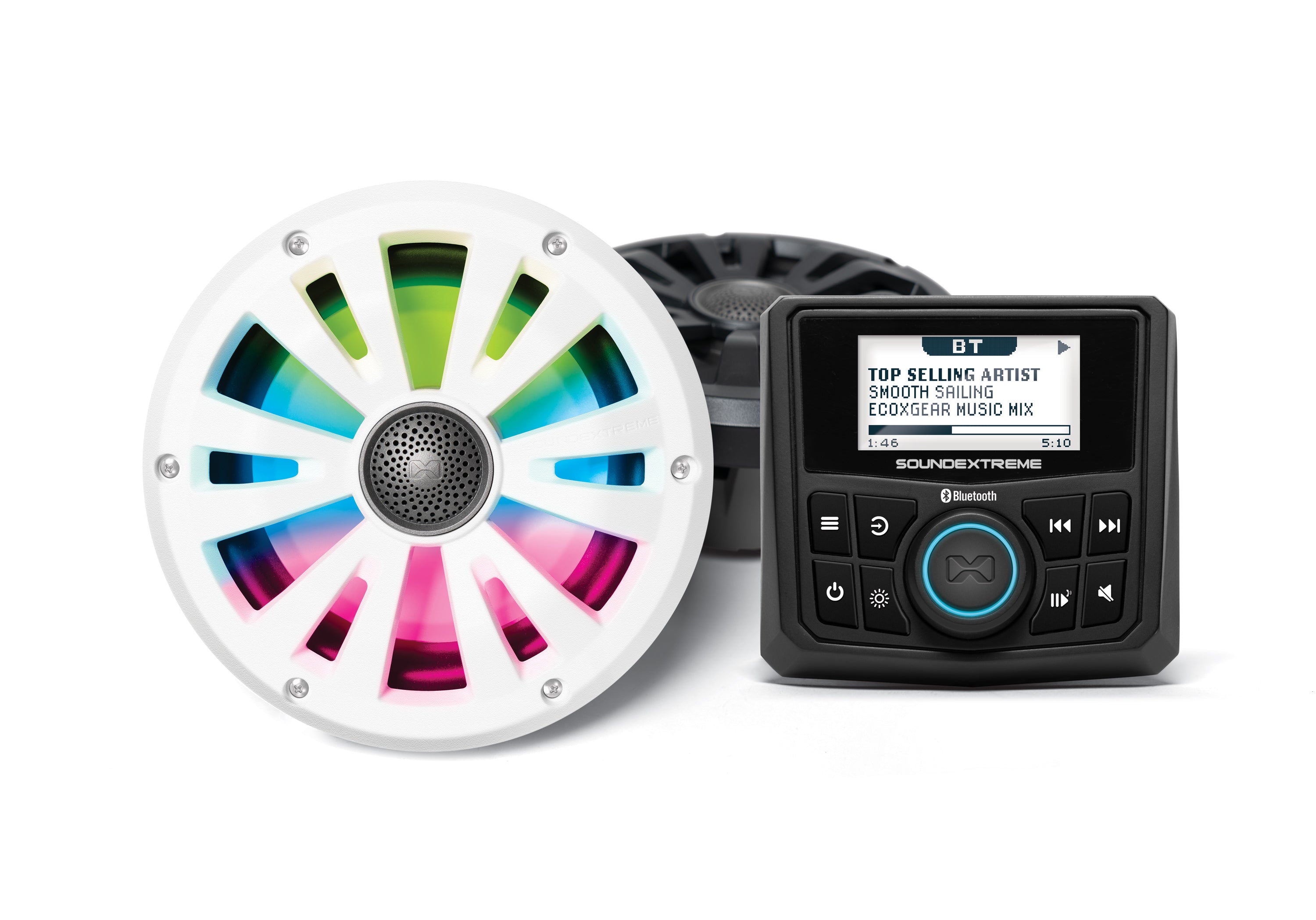 The Marine Gauge Radio LED Controller with two 6.5 EcoXGear speakers, featuring multicolored LEDs and Bluetooth, sits beside a black digital audio panel displaying playlist info; a second speaker is partially visible in the background.