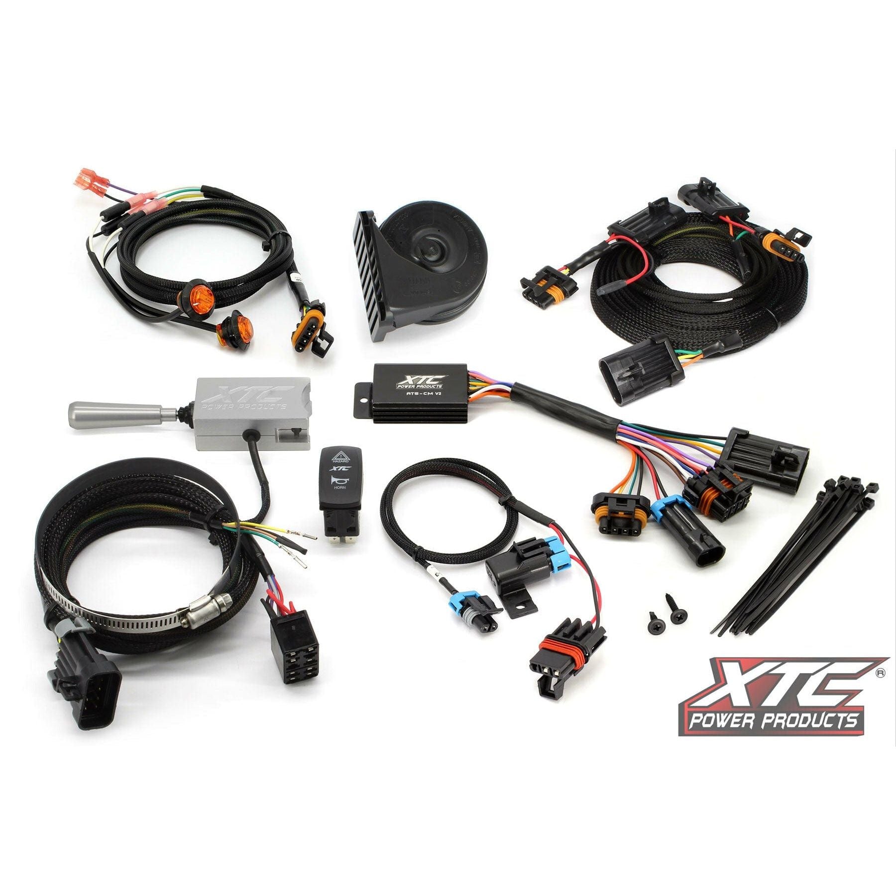 The Auto Turn Signal Kit with Billet Column Lever by XTC Power is arranged with wiring harnesses, connectors, horn, relay, switch, zip ties, and XTC modules on a white background; the XTC Power logo appears in the bottom right corner.