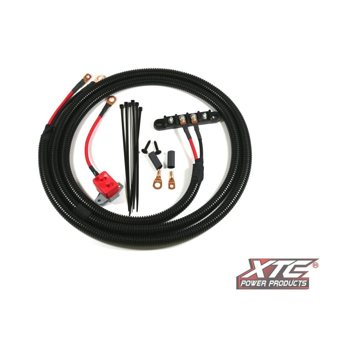 The Plug N Play 8 Power Cable Kit Universal by XTC Power, featuring cables, connectors, zip ties, fuse holders, and mounting hardware, is displayed on a white background with the XTC Power Products logo in the bottom right corner.
