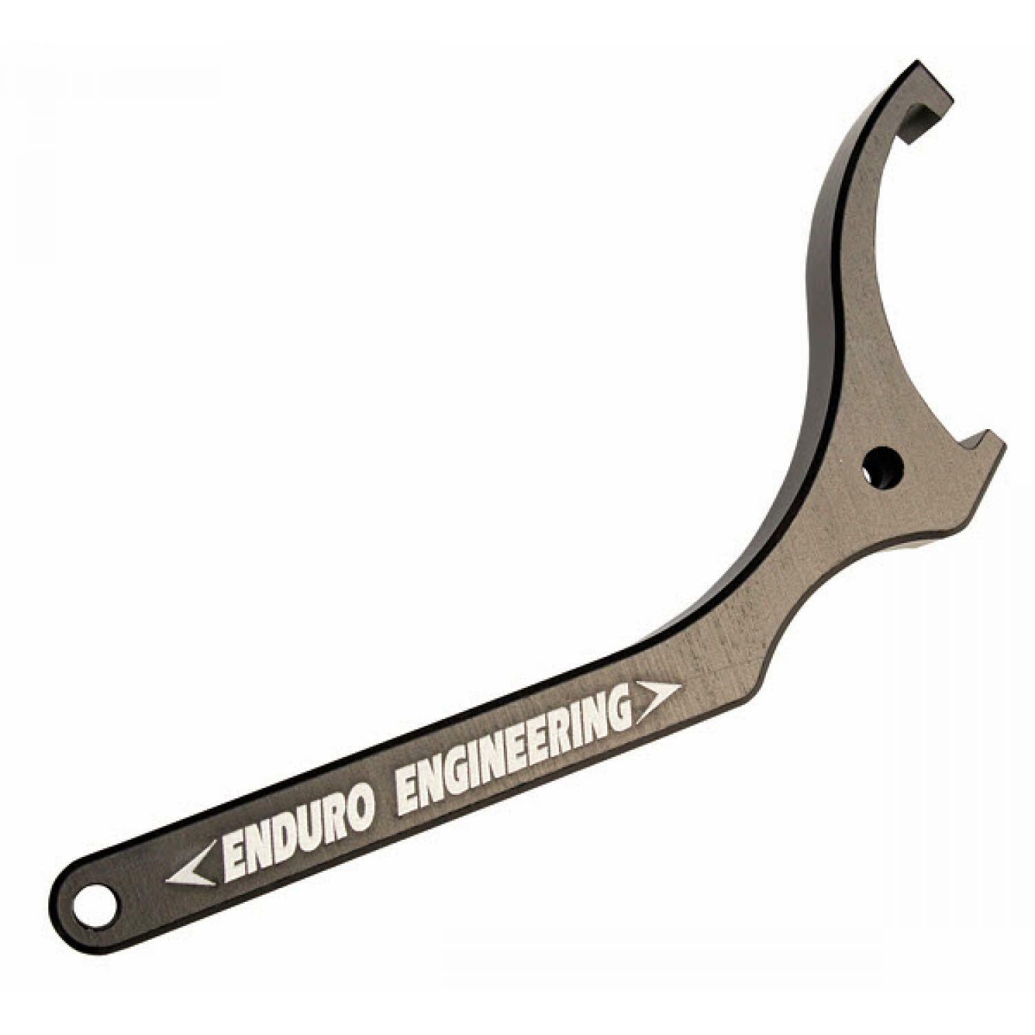 The Shock Spanner Wrench Aluminum Ring by Enduro Engineering features a curved, open end and is designed for precise motorcycle suspension and spring pre-load adjustment on WP Shock systems.