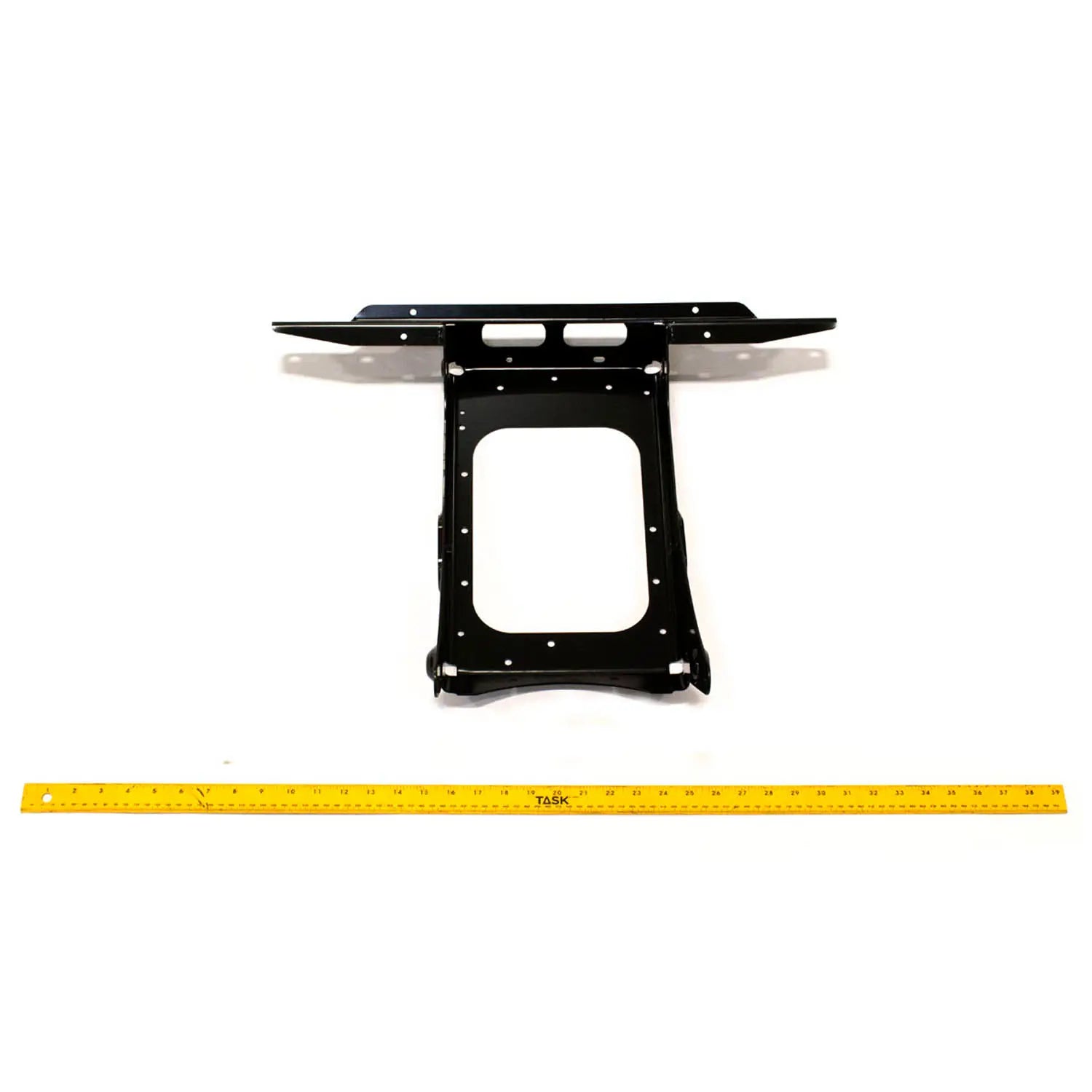Black metal rear substructure frame with mounting holes and cutout center, flat top edge.