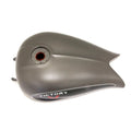 Matte gray motorcycle fuel tank with smooth contours and black Victory logo on side.