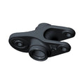 Black metal swingarm rocker assembly with rounded edges and circular bearing mounts.