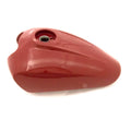 Glossy Indian red motorcycle fuel tank with smooth curves and metal filler opening.
