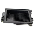Black rectangular plastic airbox lid with vented grid design and mounting points.