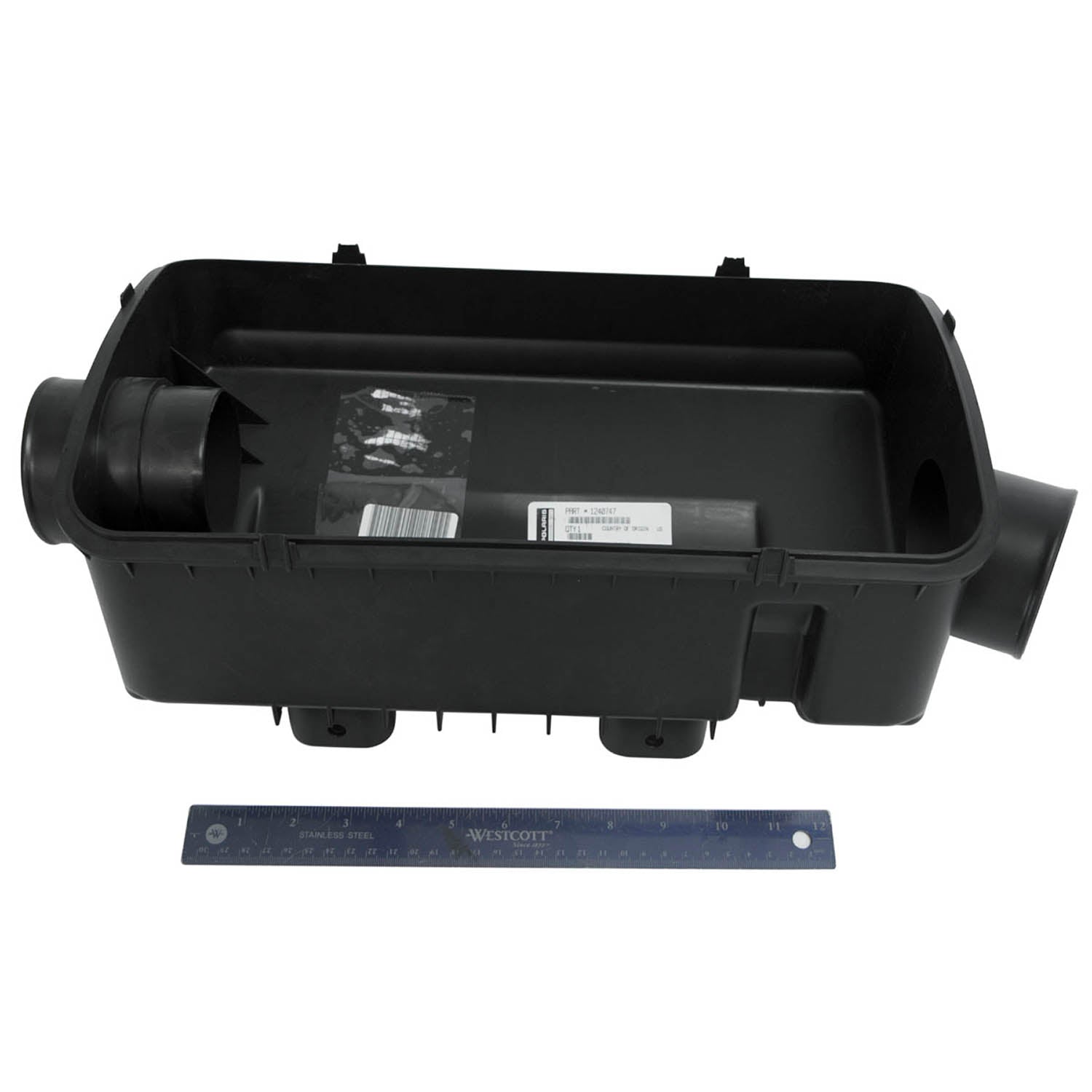 Black rectangular plastic airbox housing with intake and outlet tubes, Polaris OEM part.