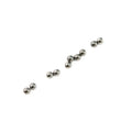 Set of small, shiny silver metallic ball bearings arranged on white background.