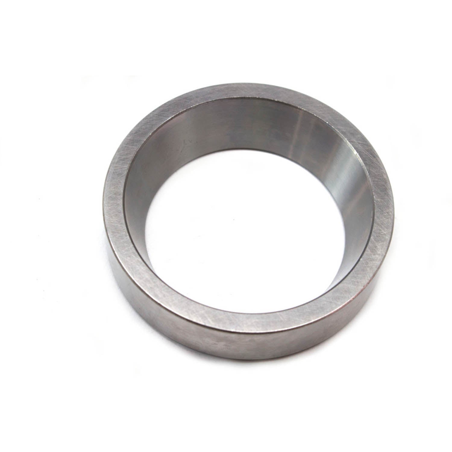 Silver metal bearing cup with smooth cylindrical inner surface and thick outer rim.
