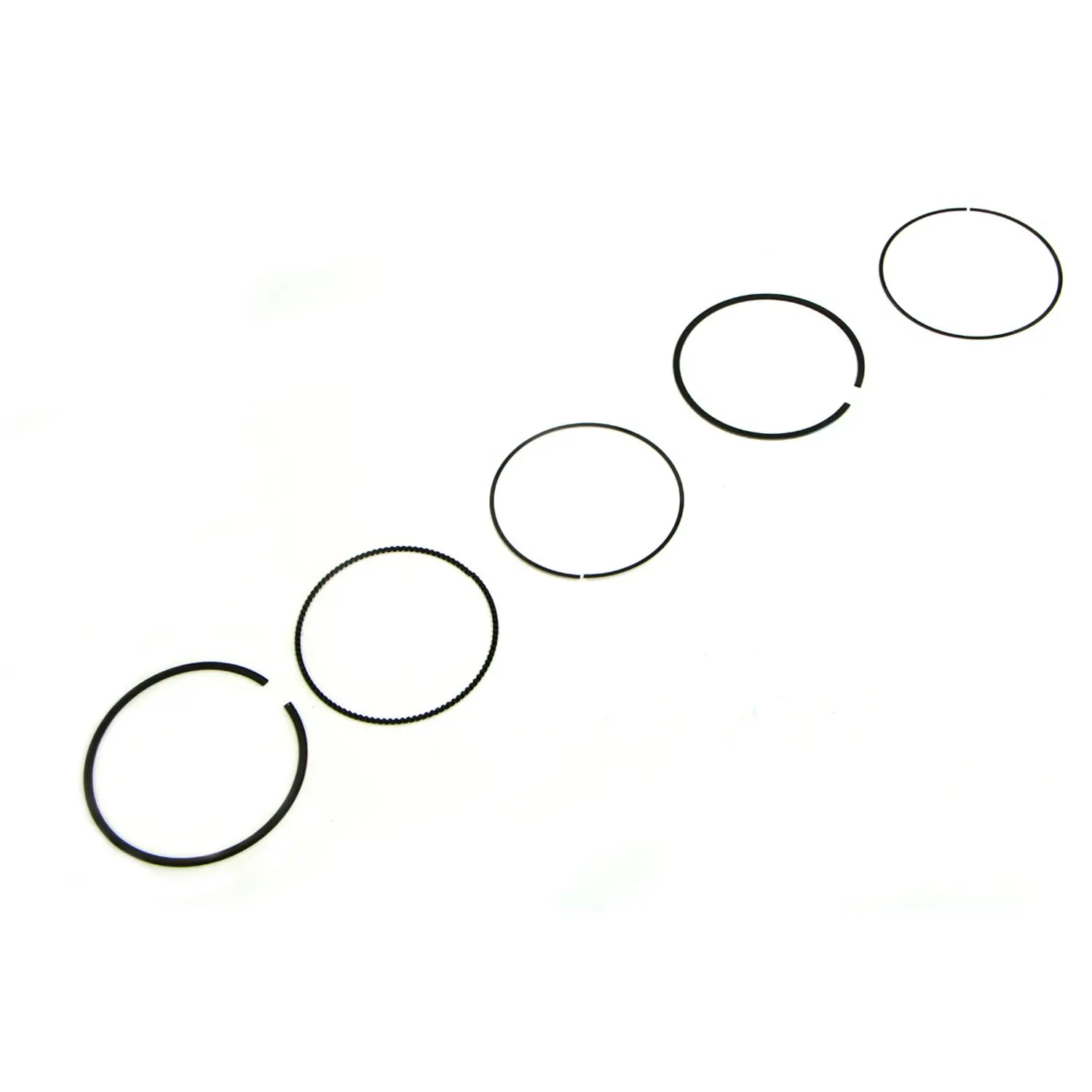 Set of five thin, black metal piston rings arranged in a row on white background.