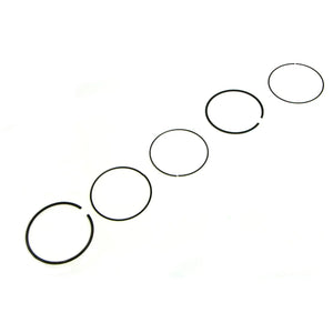 Set of five thin, black metal piston rings arranged in a row on white background.