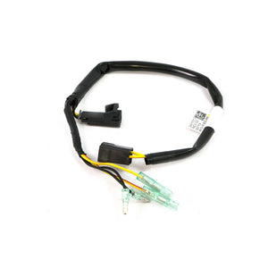 Black electrical light bar harness with protective tubing and three green terminal connectors.